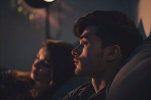 Man and woman relaxing together, symbolizing emotional connection and well-being in relationships, important for men’s mental health